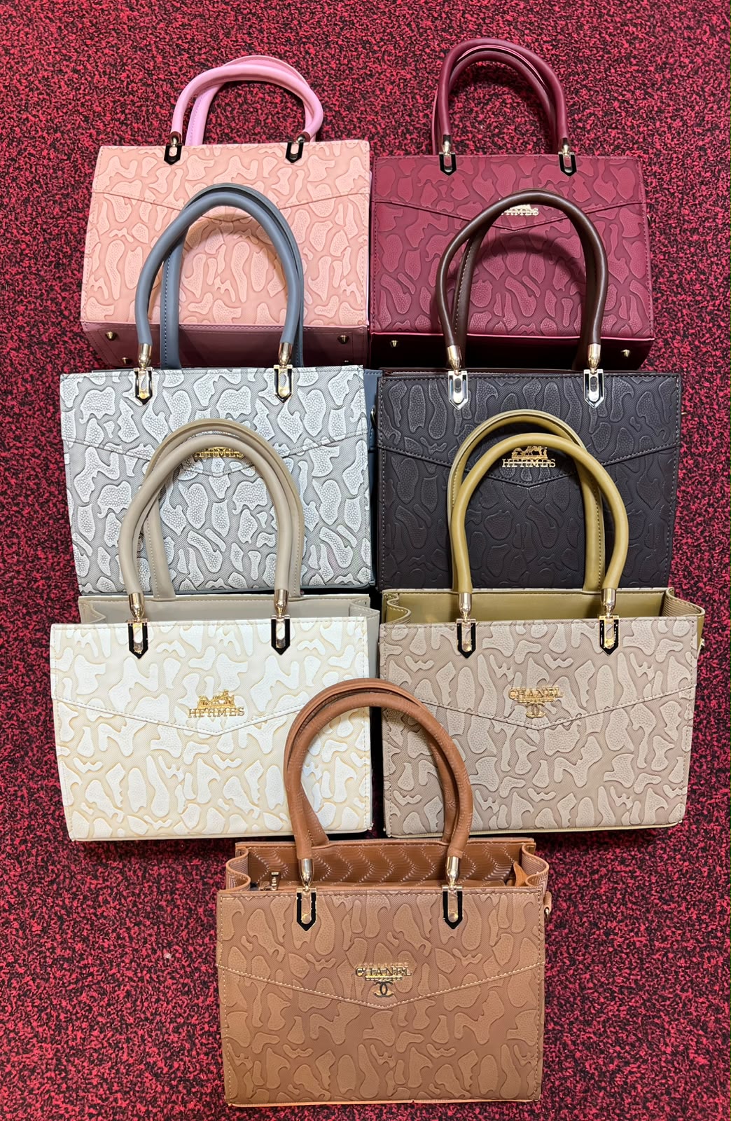 Embossed Abstract Structured Handbag - all colorways flat lay group shot