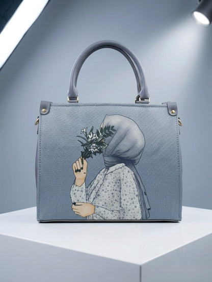 Grey hijabi art print medium handbag front view with illustrated girl holding flowers