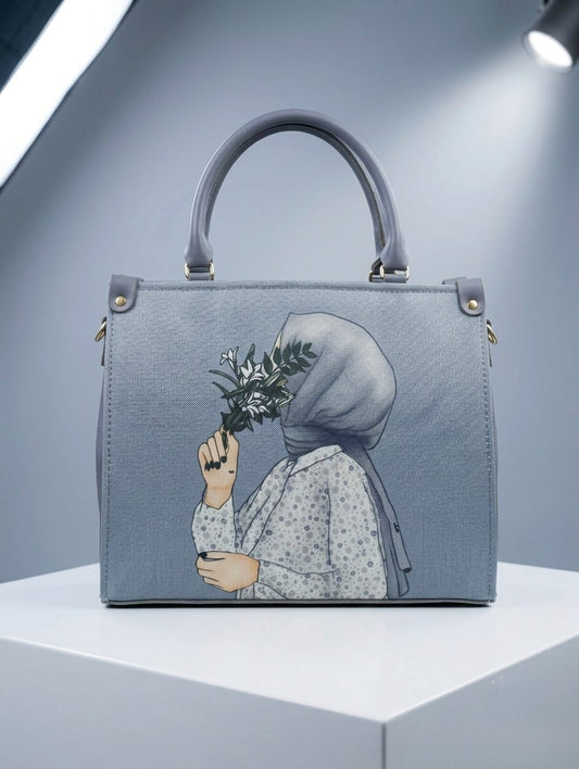 Grey hijabi art print medium handbag front view with illustrated girl holding flowers